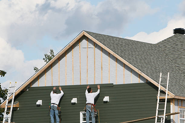 Professional Siding Installation technician working in Oldenburg, IN